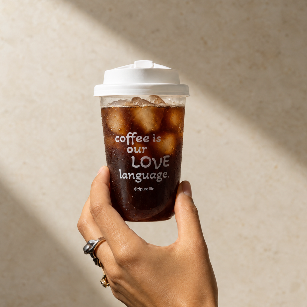 ZIPURE 16oz Grab & Sip iced espresso cup held in hand - coffee is our love language